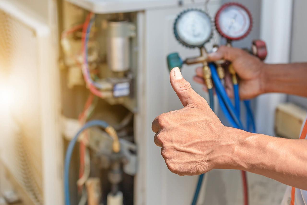HVAC technician testing system pressures while diagnosing short cycling in Ottawa