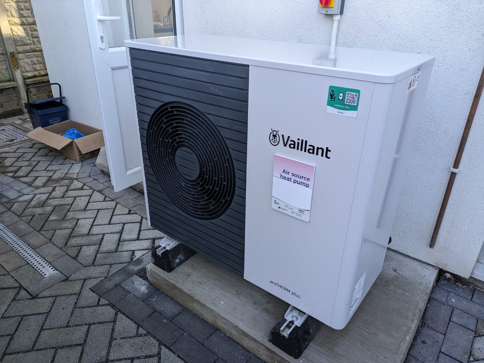 Air source heat pump installed outside an Ottawa home for winter heating